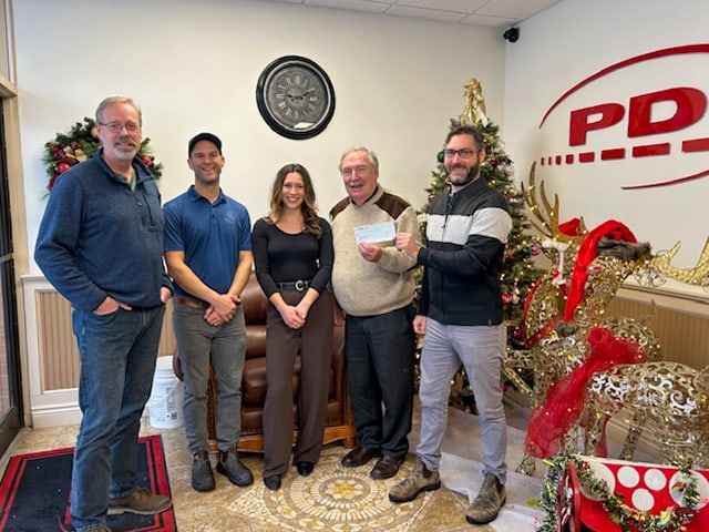 A cheque presentation in the PDI Bulk lobby